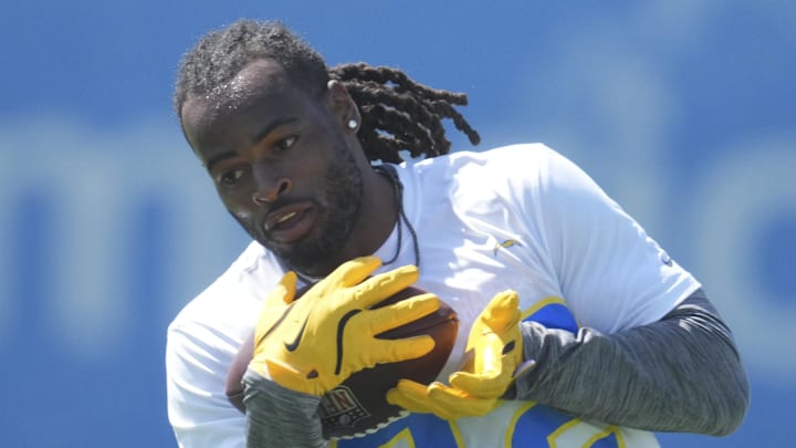 May 20, 2025; El Segundo, CA, USA; Los Angeles Chargers running back Najee Harris (22) catches the ball during offseason workouts at The Bolt.