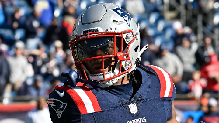 Nov 17, 2024; Foxborough, Massachusetts, USA; New England Patriots wide receiver DeMario Douglas (3) warms up before a game against the Los Angeles Rams at Gillette Stadium. Mandatory Credit: Eric Canha-Imagn Images