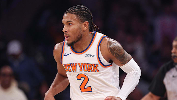 Knicks guard Miles McBride reacts on the court. 