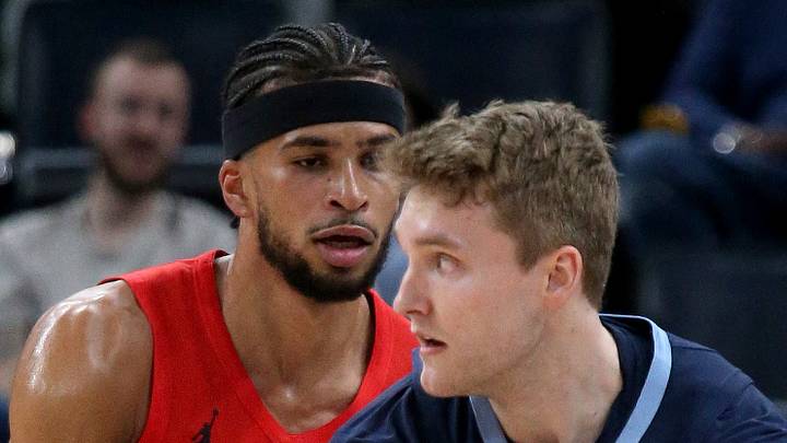 Memphis Grizzlies guard Cam Spencer handles the ball as Portland Trail Blazers forward Toumani Camara defends. Memphis Grizzlies guard Cam Spencer handles the ball as Portland Trail Blazers forward Toumani Camara defends.