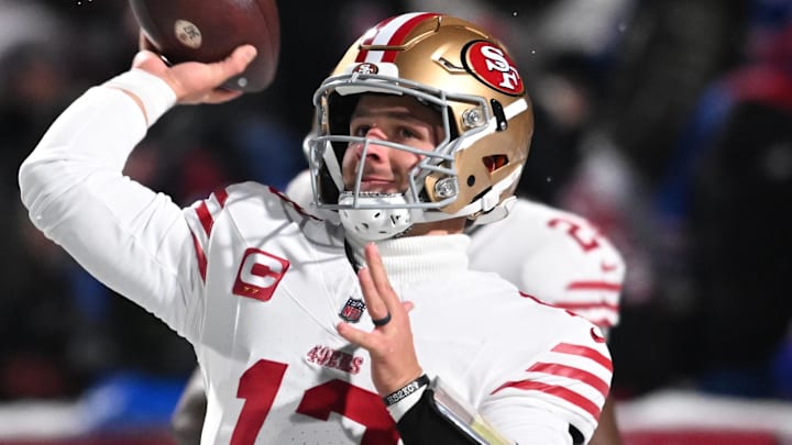 Dec 1, 2024; Orchard Park, New York, USA; San Francisco 49ers quarterback Brock Purdy (13) warms up before a game against the Buffalo Bills at Highmark Stadium. Mandatory Credit: Mark Konezny-Imagn Images
