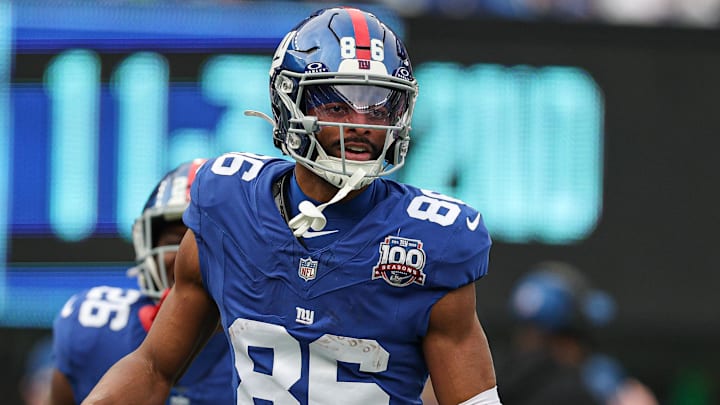Dec 29, 2024; East Rutherford, New Jersey, USA; New York Giants wide receiver Darius Slayton (86) celebrates after scoring a touchdown reception during the first half against the Indianapolis Colts at MetLife Stadium. Mandatory Credit: Vincent Carchietta-Imagn Images