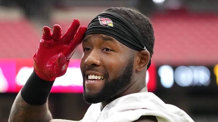 Arizona Cardinals safety Budda Baker (3) acknowledges the fans in the stands during training camp at State Farm Stadium in Glendale on July 25, 2024. Arizona Cardinals safety Budda Baker (3) acknowledges the fans in the stands during training camp at State Farm Stadium in Glendale on July 25, 2024.