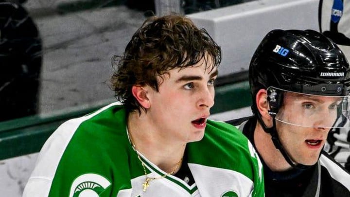 Michigan State's Porter Martone is escorted away from the scuffle during the second period in the game against Notre Dame on Thursday, Feb. 19, 2026, at the Munn Ice Arena in East Lansing. Michigan State's Porter Martone is escorted away from the scuffle during the second period in the game against Notre Dame on Thursday, Feb. 19, 2026, at the Munn Ice Arena in East Lansing.