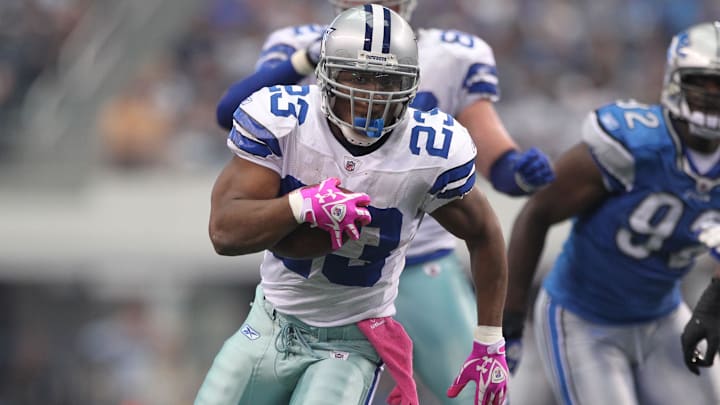 Oct 2, 2011; Arlington, TX, USA; Dallas Cowboys running back Tashard Choice (23) runs with the ball against the Detroit Lions at Cowboys Stadium.  Mandatory Credit: Matthew Emmons-Imagn Images