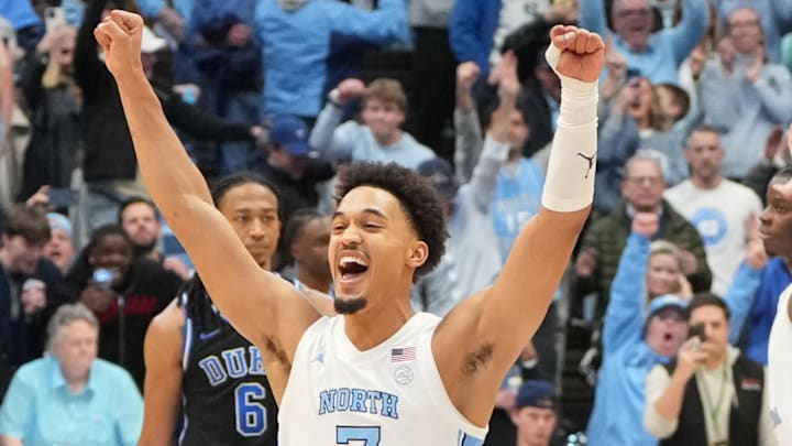 Feb 7, 2026; Chapel Hill, North Carolina, USA; North Carolina Tar Heels guard Seth Trimble (7) celebrates with teammates after the game at Dean E. Smith Center. Mandatory Credit: Bob Donnan-Imagn Images