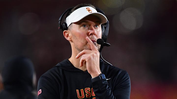 Nov 7, 2025; Los Angeles, California, USA; Southern California Trojans head coach Lincoln Riley watches game action against the Northwestern Wildcats during the second half at the Los Angeles Memorial Coliseum. Mandatory Credit: Gary A. Vasquez-Imagn Images