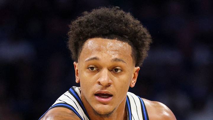 Orlando Magic forward Paolo Banchero controls the ball against the Minnesota Timberwolves.