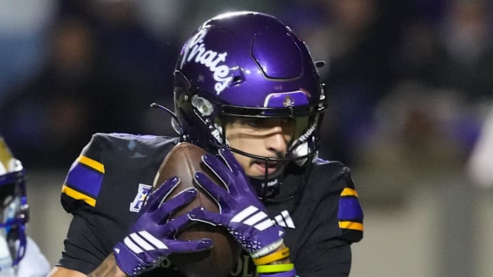 East Carolina Pirates wide receiver Anthony Smith (9) makes a touchdown catch against Tulsa. East Carolina Pirates wide receiver Anthony Smith (9) makes a touchdown catch against Tulsa.