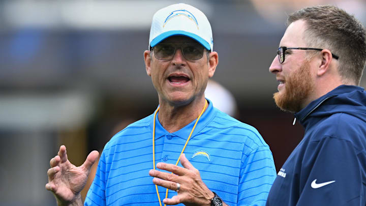 Aug 10, 2024; Inglewood, California, USA; Los Angeles Chargers head coach Jim Harbaugh against the Seattle Seahawks during the pregame warmups at SoFi Stadium. Mandatory Credit: Jonathan Hui-Imagn Images