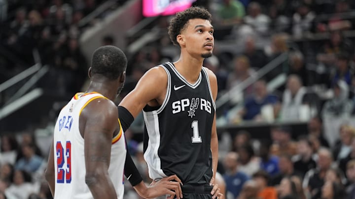 Nov 23, 2024; San Antonio, Texas, USA; San Antonio Spurs center Victor Wembanyama (1) looks up in front of Golden State Warriors forward Draymond Green (23) in the first half at Frost Bank Center. Nov 23, 2024; San Antonio, Texas, USA; San Antonio Spurs center Victor Wembanyama (1) looks up in front of Golden State Warriors forward Draymond Green (23) in the first half at Frost Bank Center.