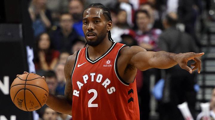 Oct 24, 2018; Toronto, Ontario, CAN; Toronto Raptors forward Kawhi Leonard (2) gestures to team mates as he dribbles the ball in the second half against Minnesota Timberwolves at Scotiabank Arena. Mandatory Credit: Dan Hamilton-USA TODAY Sports Oct 24, 2018; Toronto, Ontario, CAN; Toronto Raptors forward Kawhi Leonard (2) gestures to team mates as he dribbles the ball in the second half against Minnesota Timberwolves at Scotiabank Arena. Mandatory Credit: Dan Hamilton-USA TODAY Sports