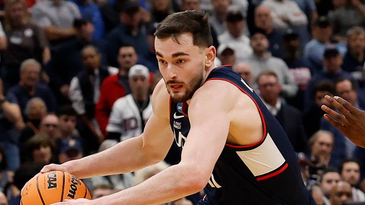 Mar 29, 2026; Washington, DC, USA; UConn Huskies forward Alex Karaban (11) drives to the basket against the Duke Blue Devils during an Elite Eight game of the East Regional of the men's 2026 NCAA Tournament at Capital One Arena. Mandatory Credit: Geoff Burke-Imagn Images