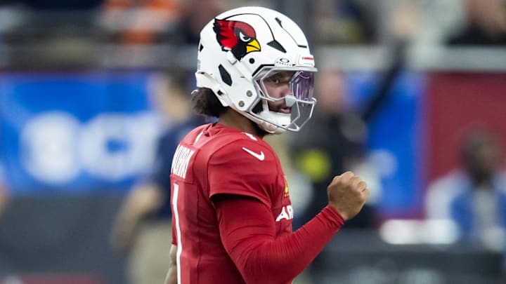 Nov 3, 2024; Glendale, Arizona, USA; Arizona Cardinals quarterback Kyler Murray (1) celebrates a touchdown against the Chicago Bears in the first half at State Farm Stadium. Mandatory Credit: Mark J. Rebilas-Imagn Images