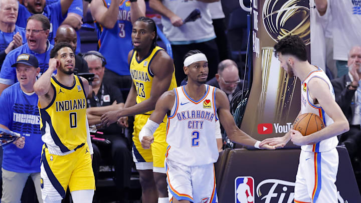 Jun 16, 2025; Oklahoma City, Oklahoma, USA; Oklahoma City Thunder guard Shai Gilgeous-Alexander (2) and forward Chet Holmgren (7) celebrate during the fourth quarter against the Indiana Pacers in game five of the 2025 NBA Finals at Paycom Center. Mandatory Credit: Alonzo Adams-Imagn Images