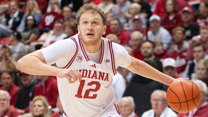 Indiana's Tucker DeVries (12) drives against Northwestern at Simon Skjodt Assembly Hall on Tuesday, Feb. 24, 2026. Indiana's Tucker DeVries (12) drives against Northwestern at Simon Skjodt Assembly Hall on Tuesday, Feb. 24, 2026.