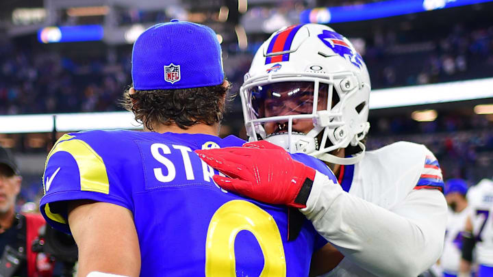 Dec 8, 2024; Inglewood, California, USA; Buffalo Bills running back Ty Johnson (26) meets with Los Angeles Rams quarterback Matthew Stafford (9) following the game at SoFi Stadium. Mandatory Credit: Gary A. Vasquez-Imagn Images