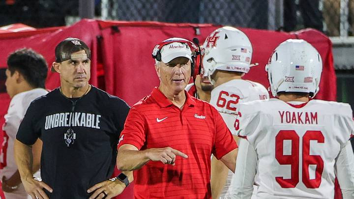 Nov 7, 2025; Orlando, Florida, USA; Houston Cougars head coach Willie Fritz talks with Houston Cougars kicker Zac Yoakam (96) during the second half against the UCF Knights at Acrisure Bounce House. Mandatory Credit: Mike Watters-Imagn Images Nov 7, 2025; Orlando, Florida, USA; Houston Cougars head coach Willie Fritz talks with Houston Cougars kicker Zac Yoakam (96) during the second half against the UCF Knights at Acrisure Bounce House. Mandatory Credit: Mike Watters-Imagn Images