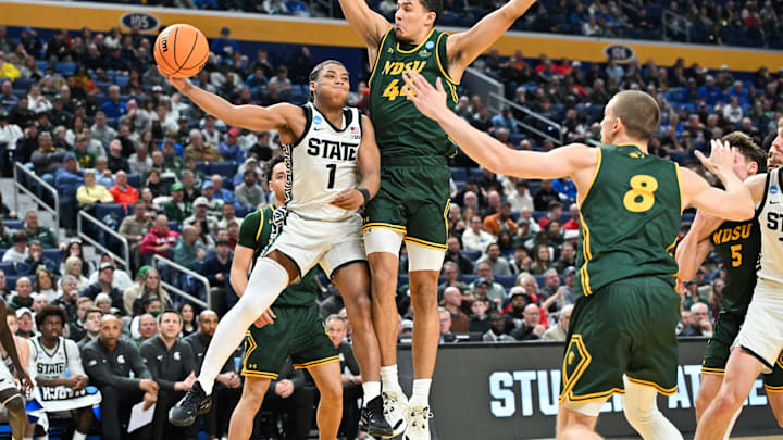 Mar 19, 2026; Buffalo, NY, USA; Michigan State Spartans guard Jeremy Fears Jr. (1) passes the ball as NDSU Bison forward Treyson Anderson (44) defends.