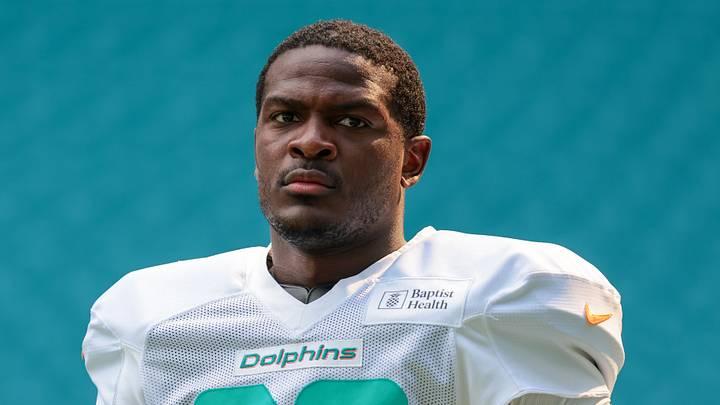 Aug 8, 2026; Miami Gardens, FL, USA; Miami Dolphins running back De'von Achane (28) looks on from the field during practice at Hard Rock Stadium. Mandatory Credit: Sam Navarro-Imagn Images