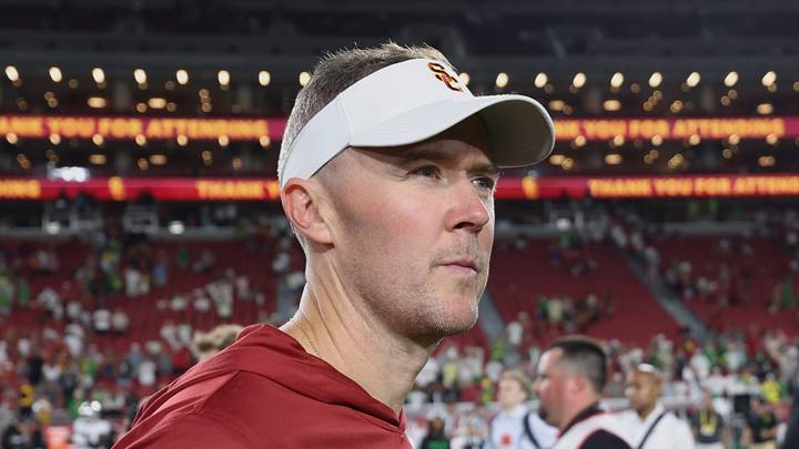 Sep 26, 2026; Los Angeles, California, USA; USC Trojans head coach Lincoln Riley walks off the field after the game against the Oregon Ducks at United Airlines Field at Los Angeles Memorial Coliseum. Mandatory Credit: Kiyoshi Mio-Imagn Images Sep 26, 2026; Los Angeles, California, USA; USC Trojans head coach Lincoln Riley walks off the field after the game against the Oregon Ducks at United Airlines Field at Los Angeles Memorial Coliseum. Mandatory Credit: Kiyoshi Mio-Imagn Images