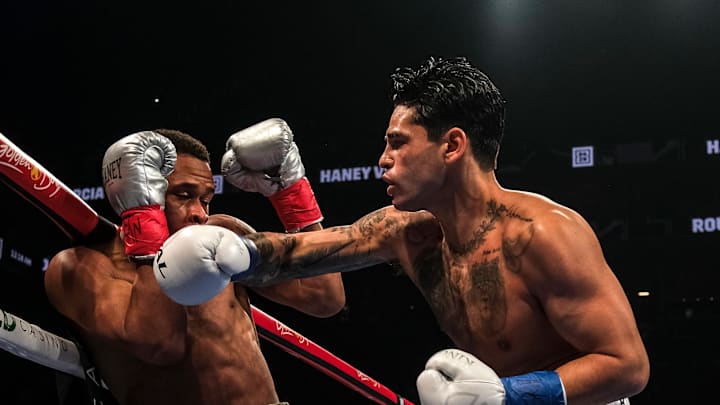 Ryan Garcia lands a right hand on Devin Haney on April 20, 2024, at the Barclays Center in Brooklyn, NY.