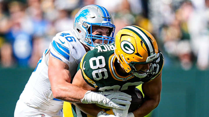 Detroit Lions linebacker Jack Campbell (46) tackles Green Bay Packers tight end John FitzPatrick (86) 