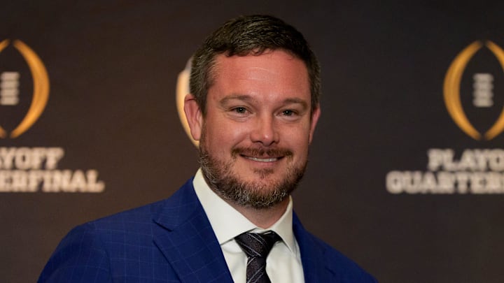 Oregon head coach Dan Lanning holds an orange during the head coaches press conference ahead of Orange Bowl on Dec. 31, 2025, in Dania Beach, Florida.