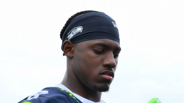 Seattle Seahawks running back Jadarian Price interacts with fans