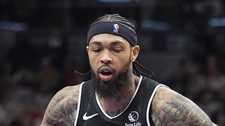 San Antonio Spurs guard De'Aaron Fox defends against Toronto Raptors forward Brandon Ingram. San Antonio Spurs guard De'Aaron Fox defends against Toronto Raptors forward Brandon Ingram.