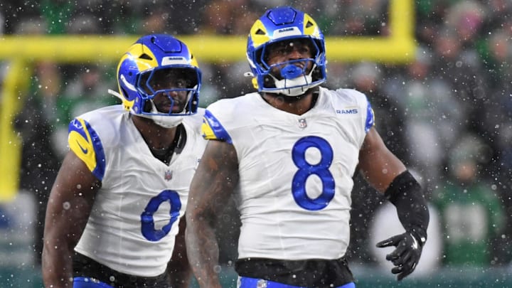 Jan 19, 2025; Philadelphia, Pennsylvania, USA; Los Angeles Rams linebacker Byron Young (0) and linebacker Jared Verse (8) celebrate a sack against the Philadelphia Eagles in a 2025 NFC divisional round game at Lincoln Financial Field. Mandatory Credit: Eric Hartline-Imagn Images Jan 19, 2025; Philadelphia, Pennsylvania, USA; Los Angeles Rams linebacker Byron Young (0) and linebacker Jared Verse (8) celebrate a sack against the Philadelphia Eagles in a 2025 NFC divisional round game at Lincoln Financial Field. Mandatory Credit: Eric Hartline-Imagn Images