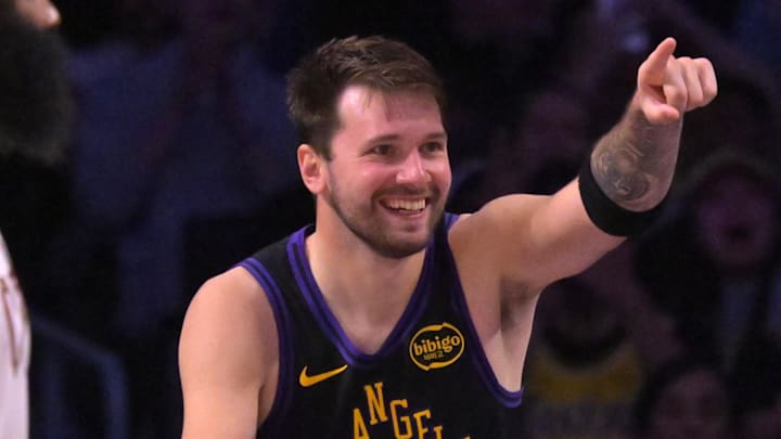 Mar 31, 2026; Los Angeles, California, USA;  Los Angeles Lakers guard Luka Doncic (77) reacts after a basket in the second half against the Cleveland Cavaliers at Crypto.com Arena. Mandatory Credit: Jayne Kamin-Oncea-Imagn Images