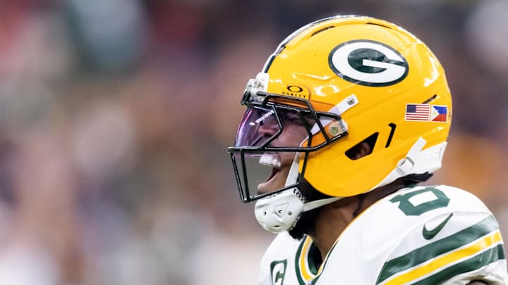 Green Bay Packers running back Josh Jacobs (8) celebrates against the Arizona Cardinals. Green Bay Packers running back Josh Jacobs (8) celebrates against the Arizona Cardinals.