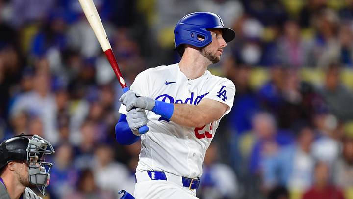 May 26, 2026; Los Angeles, California, USA; Los Angeles Dodgers right fielder Kyle Tucker (23) hits a single against the Colorado Rockies during the sixth inning at Dodger Stadium. Mandatory Credit: Gary A. Vasquez-Imagn Images