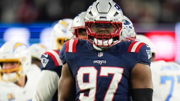Jan 11, 2026; Foxborough, MA, USA; New England Patriots defensive end Milton Williams (97) celebrates a sack during the second quarter against the Los Angeles Chargers in an AFC Wild Card Round game at Gillette Stadium.