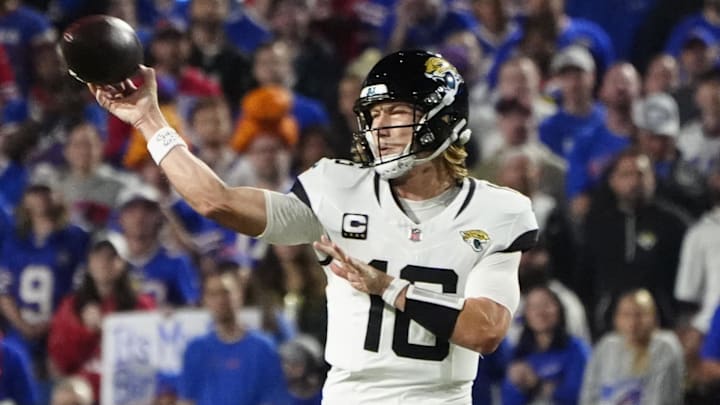 Sep 23, 2024; Orchard Park, New York, USA; Jacksonville Jaguars quarterback Trevor Lawrence (16) throws against the Buffalo Bills during the first half at Highmark Stadium. Mandatory Credit: Gregory Fisher-Imagn Images