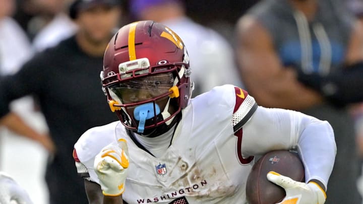 Washington Commanders wide receiver Deebo Samuel Sr. runs against the Los Angeles Chargers.