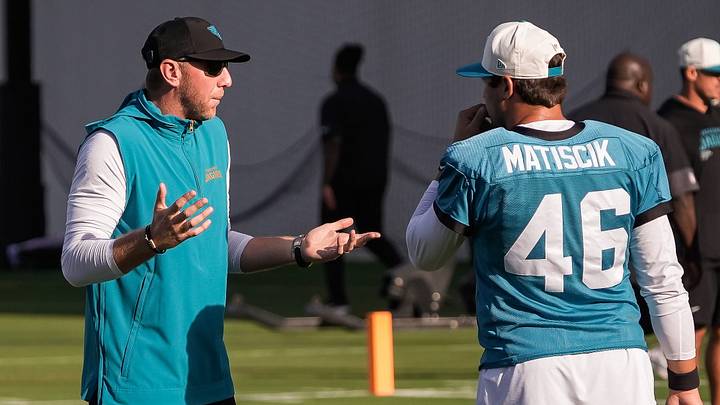 Jacksonville Jaguars Head Coach Liam Coen talks with Jacksonville Jaguars Long Snapper Ross Matiscik (46) during the Jacksonville Jaguars 10th day of NFL Training Camp at the Miller Electric Center in Jacksonville, Fla., Sunday, August 9, 2026.    [Doug Engle/Florida Times-Union]