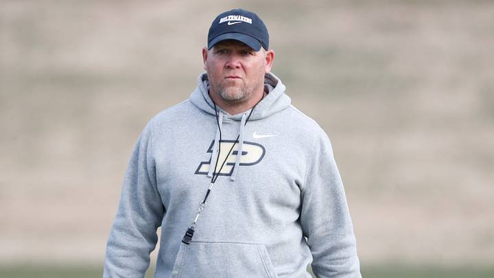 Purdue Boilermakers head coach Barry Odom looks down the field. Purdue Boilermakers head coach Barry Odom looks down the field.