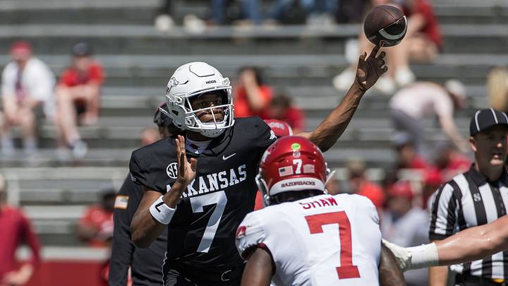 Arkansas Razorbacks quarterback KJ Jackson (7) throws a pass over linebacker Bradley Shaw (7) during the spring game at Razorback Stadium. Arkansas Razorbacks quarterback KJ Jackson (7) throws a pass over linebacker Bradley Shaw (7) during the spring game at Razorback Stadium.