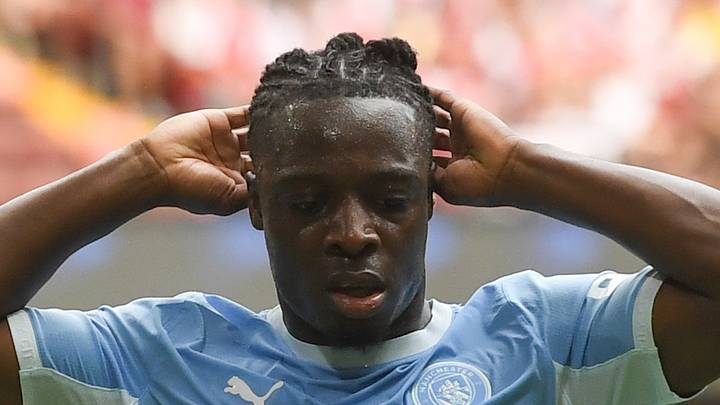 Jeremy Doku plays for Manchester City against Arsenal