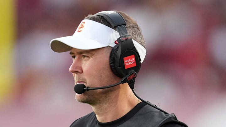 Aug 30, 2025; Los Angeles, California, USA; Southern California Trojans head coach Lincoln Riley watches from the sidelines against the Missouri State Bears in the first half at United Airlines Field at Los Angeles Memorial Coliseum. Mandatory Credit: Kirby Lee-Imagn Images