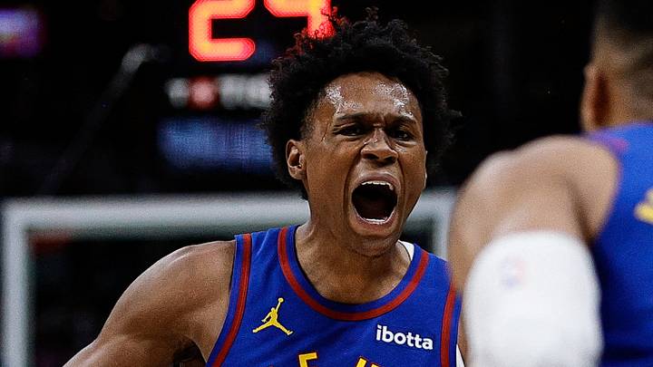 Mar 24, 2025; Denver, Colorado, USA; Denver Nuggets forward Peyton Watson (8) reacts with guard Russell Westbrook (4) after a play in the third quarter against the Chicago Bulls at Ball Arena. Mandatory Credit: Isaiah J. Downing-Imagn Images