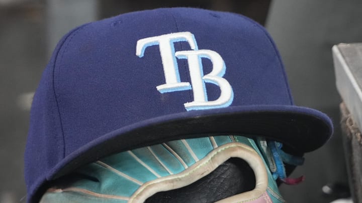 Sep 26, 2025; Toronto, Ontario, CAN; The hat and glove of Tampa Bay Rays third baseman Junior Caminero (13) in the dugout during the game against the Toronto Blue Jays at Rogers Centre. Sep 26, 2025; Toronto, Ontario, CAN; The hat and glove of Tampa Bay Rays third baseman Junior Caminero (13) in the dugout during the game against the Toronto Blue Jays at Rogers Centre.