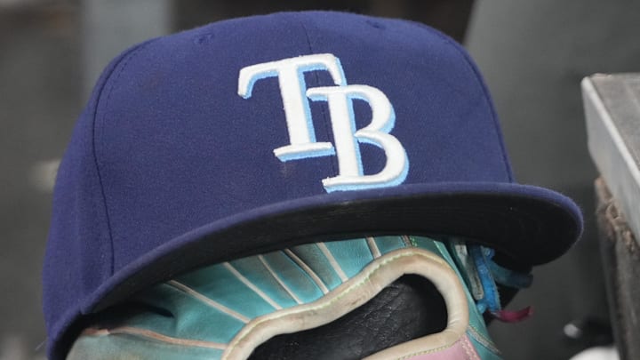 Sep 26, 2025; Toronto, Ontario, CAN; The hat and glove of Tampa Bay Rays third baseman Junior Caminero (13) in the dugout during the game against the Toronto Blue Jays at Rogers Centre. Sep 26, 2025; Toronto, Ontario, CAN; The hat and glove of Tampa Bay Rays third baseman Junior Caminero (13) in the dugout during the game against the Toronto Blue Jays at Rogers Centre.