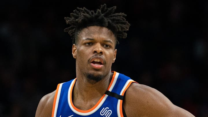 New York Knicks guard Dennis Smith Jr. dribbles the ball against the Philadelphia 76ers. New York Knicks guard Dennis Smith Jr. dribbles the ball against the Philadelphia 76ers.