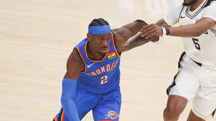 May 20, 2026; Oklahoma City, Oklahoma, USA; Oklahoma City Thunder guard Shai Gilgeous-Alexander (2) drives to the basket as San Antonio Spurs guard Stephon Castle (5) defends during the first quarter during game two of the western conference finals for the 2026 NBA playoffs at Paycom Center. Mandatory Credit: Brett Rojo-Imagn Images May 20, 2026; Oklahoma City, Oklahoma, USA; Oklahoma City Thunder guard Shai Gilgeous-Alexander (2) drives to the basket as San Antonio Spurs guard Stephon Castle (5) defends during the first quarter during game two of the western conference finals for the 2026 NBA playoffs at Paycom Center. Mandatory Credit: Brett Rojo-Imagn Images