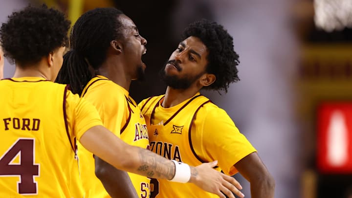 Jan 24, 2026; Tempe, Arizona, USA; Arizona State Sun Devils guard Maurice Odum (5) celebrates with teammates Anthony Johnson (2) and Bryce Ford (4) against the Cincinnati Bearcats in the second half at Desert Financial Arena. Mandatory Credit: Mark J. Rebilas-Imagn Images