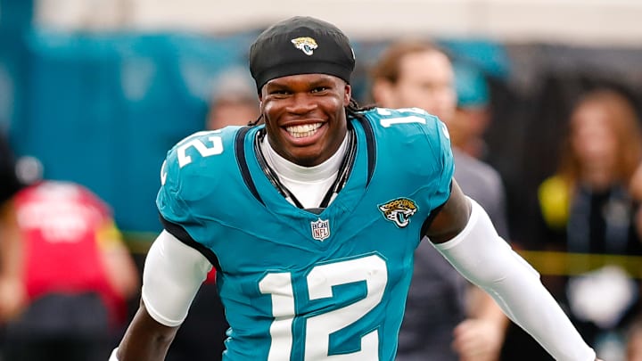 Aug 9, 2025; Jacksonville, Florida, USA; Jacksonville Jaguars wide receiver Travis Hunter (12) enters the field from the team entrance before a preseason game against the Pittsburgh Steelers at EverBank Stadium. Mandatory Credit: Travis Register-Imagn Images