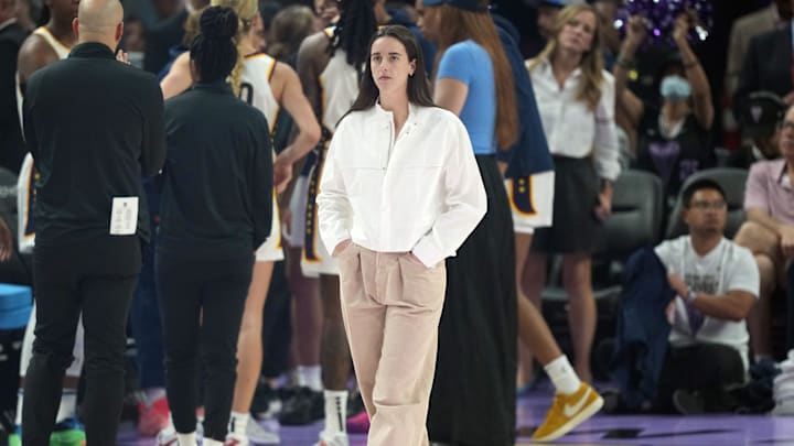 Indiana Fever star Caitlin Clark greeted two San Francisco 49ers stars and their wives during her team's matchup with the Golden State Valkyries.